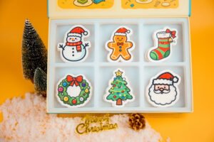 Christmas Friends Collection Thumbnail – Doyourclean Eco Sponges Christmas Friends sponge gift set displayed with Doyourclean box, featuring festive designs like Santa, wreath, and snowman.