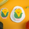 Vegetable Friends â Corn Eco Sponge | Biodegradable Kitchen Cleaning Corn-shaped cellulose sponge from Doyourcleanâs Vegetable Friends series placed on yellow background.