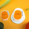 Vegetable Friends â Potato Eco Sponge | Doyourclean Single potato-shaped Doyourclean cellulose sponge on a yellow backdrop with vegetables.