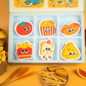 Tasty Friends Sponge Set – Cute Biodegradable Kitchen Gift Another angle of Doyourclean Tasty Friends cellulose sponge set with yellow background and popcorn props.