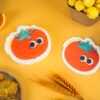 Tasty Friends â Tomato Sponge | Eco-Friendly Cleaning Set Two red tomato-shaped cellulose sponges by Doyourclean with smiling faces.