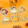 Bakery Friends â Cute Bakery Sponge Set | Eco Kitchen Cleaning Sponges A lineup of Doyourcleanâs Bakery Friends cellulose sponges shaped like cake, croissant, pizza, and cookie, arranged on a golden background with warm bakery props.